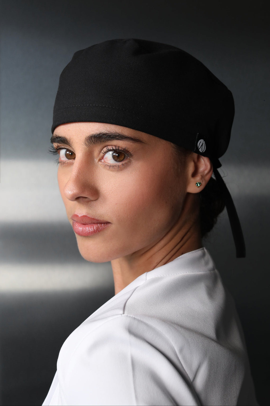 Woman wearing Black Women’s Surgical Cap by Work & Chill