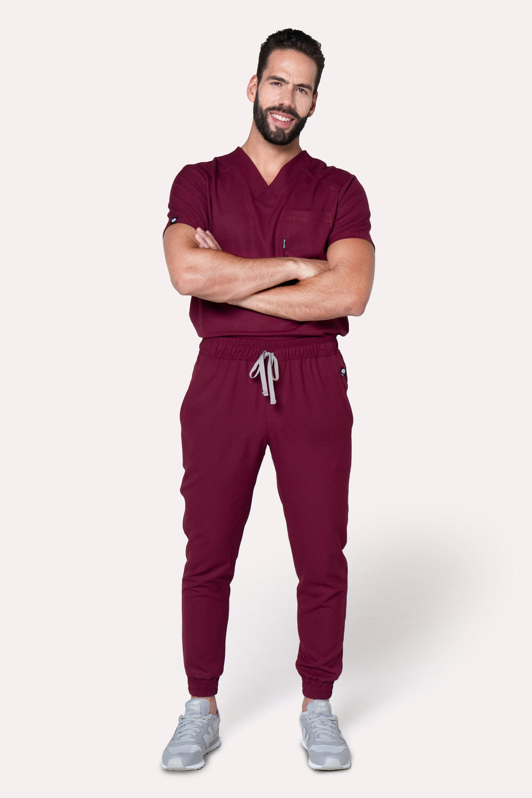 Model wearing Fresh Burgundy Scrub Pants with matching Fresh Scrub Top