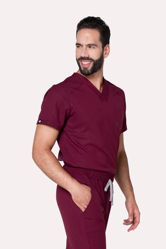 Three-quarter view of Fresh Burgundy Scrub Top showing the comfortable tailored fit