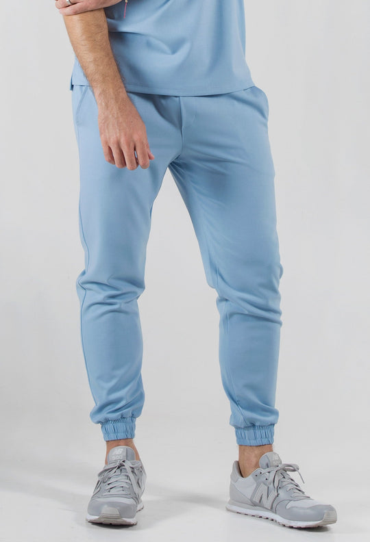 Man wearing Fresh Dream Blue Scrub Pants by Work &amp; Chill