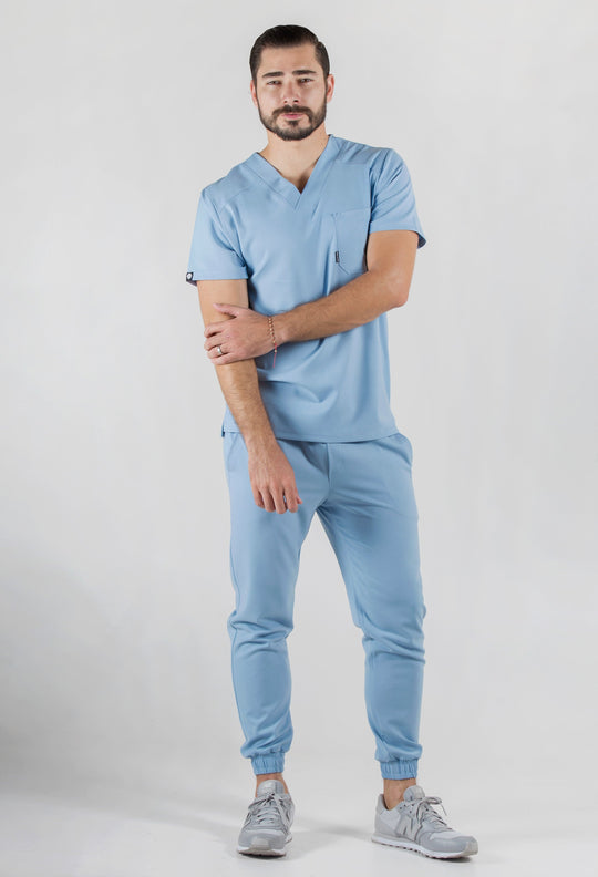 Model wearing Fresh Dream Blue Scrub Pants with matching Fresh Scrub Top