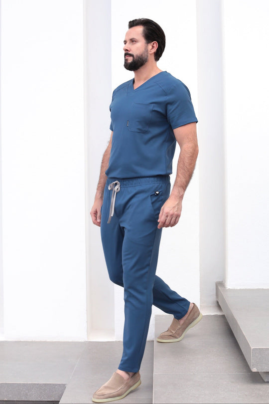 Model wearing Fresh Indigo Scrub Pants with matching Fresh Scrub Top