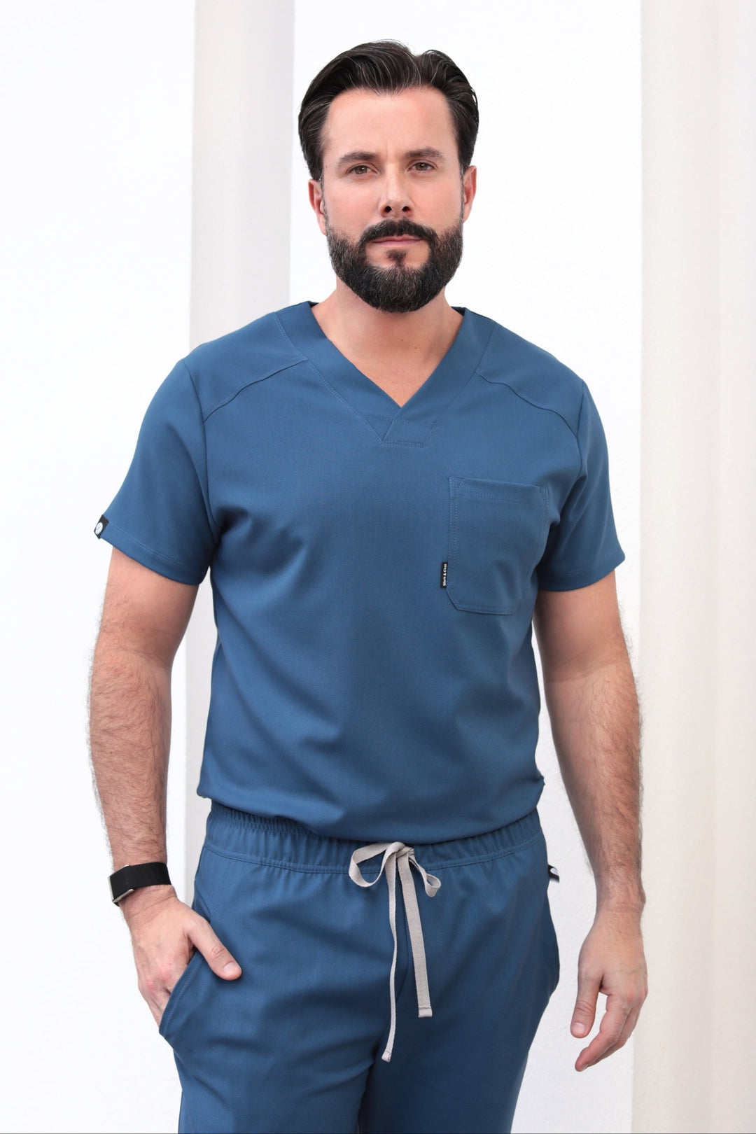 Man wearing Fresh Indigo Scrub Top by Work &amp; Chill