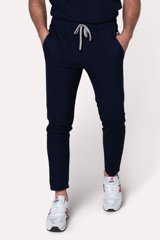 Front view of Fresh Navy Scrub Pants showing the jogger fit and drawstring waist