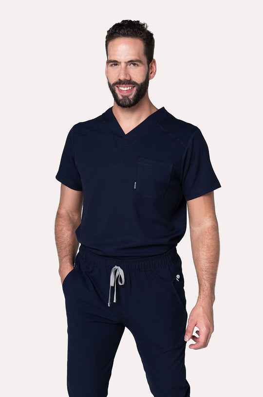 Man wearing Fresh Navy Scrub Top by Work &amp; Chill