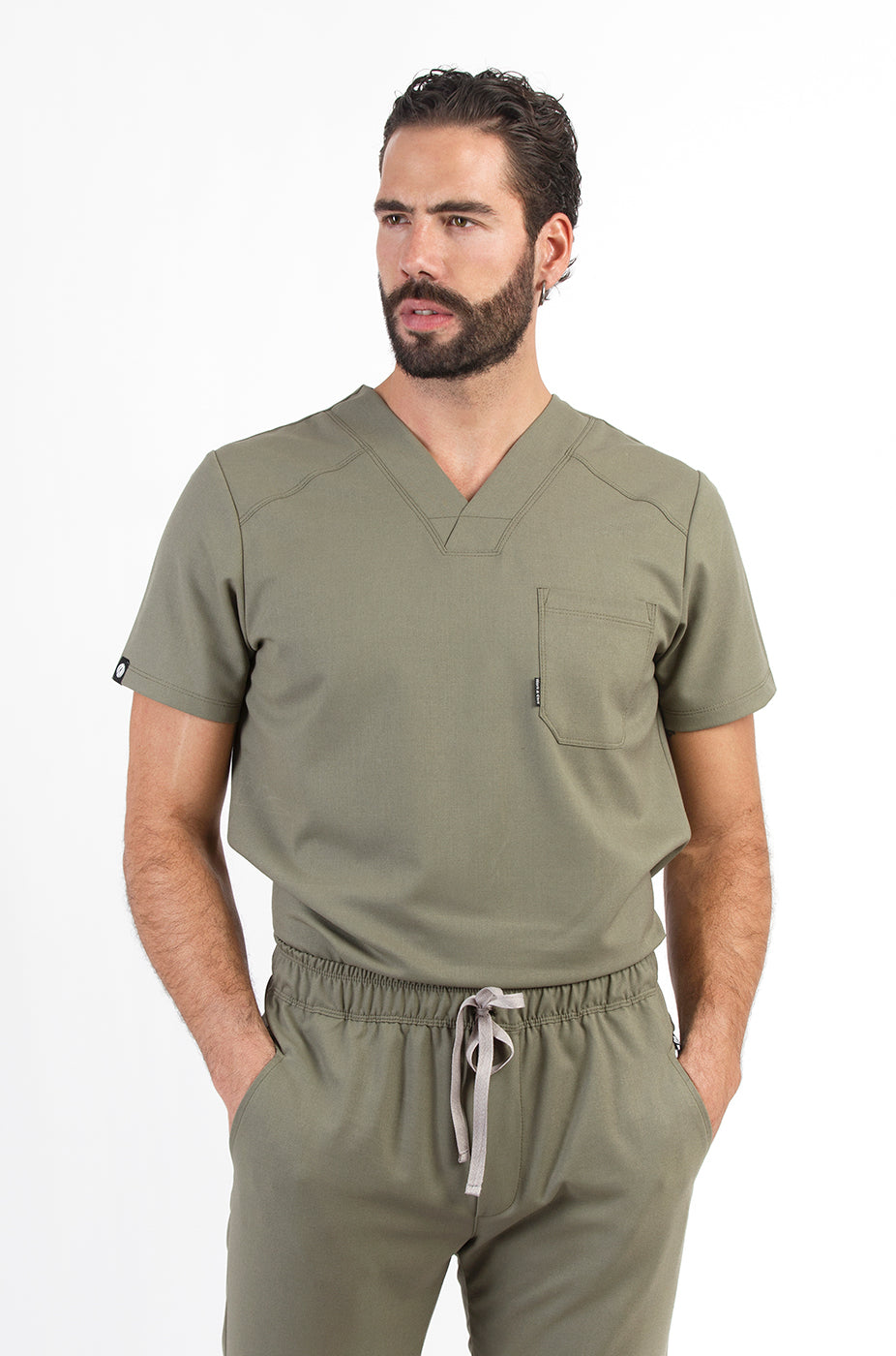 Model wearing Fresh Olive Scrub Top with matching Fresh Scrub Pants