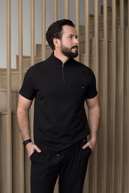 Side view of Harry Black Scrub Top showing the tailored fit