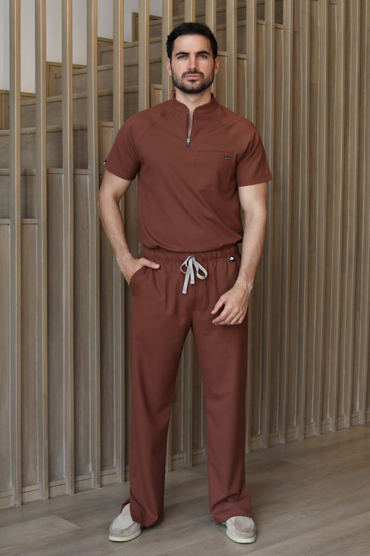 Full-body view of the Harry Cocoa Scrub Pants styled with the matching scrub top.