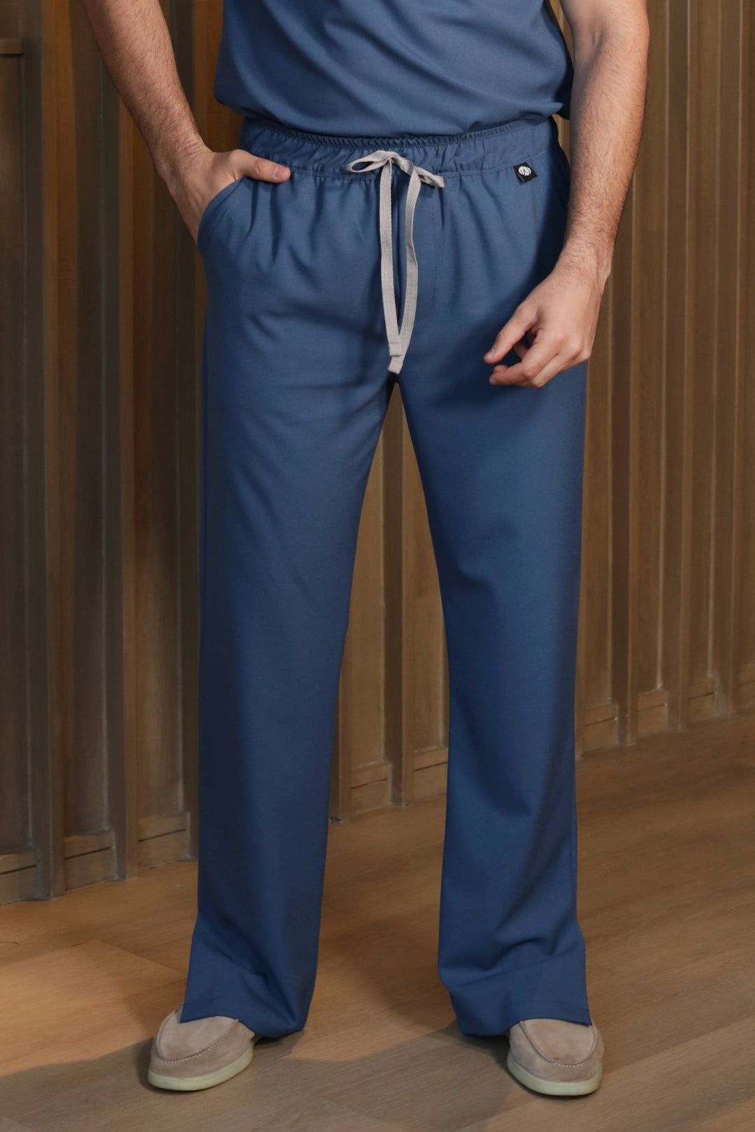 Man wearing Harry Indigo Scrub Pants by Work &amp; Chill