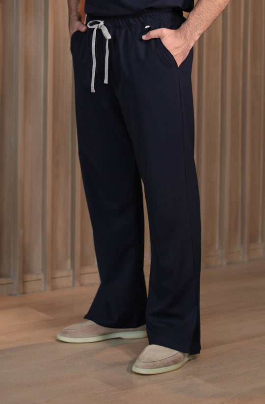 Man wearing Harry Navy Scrub Pants by Work &amp; Chill