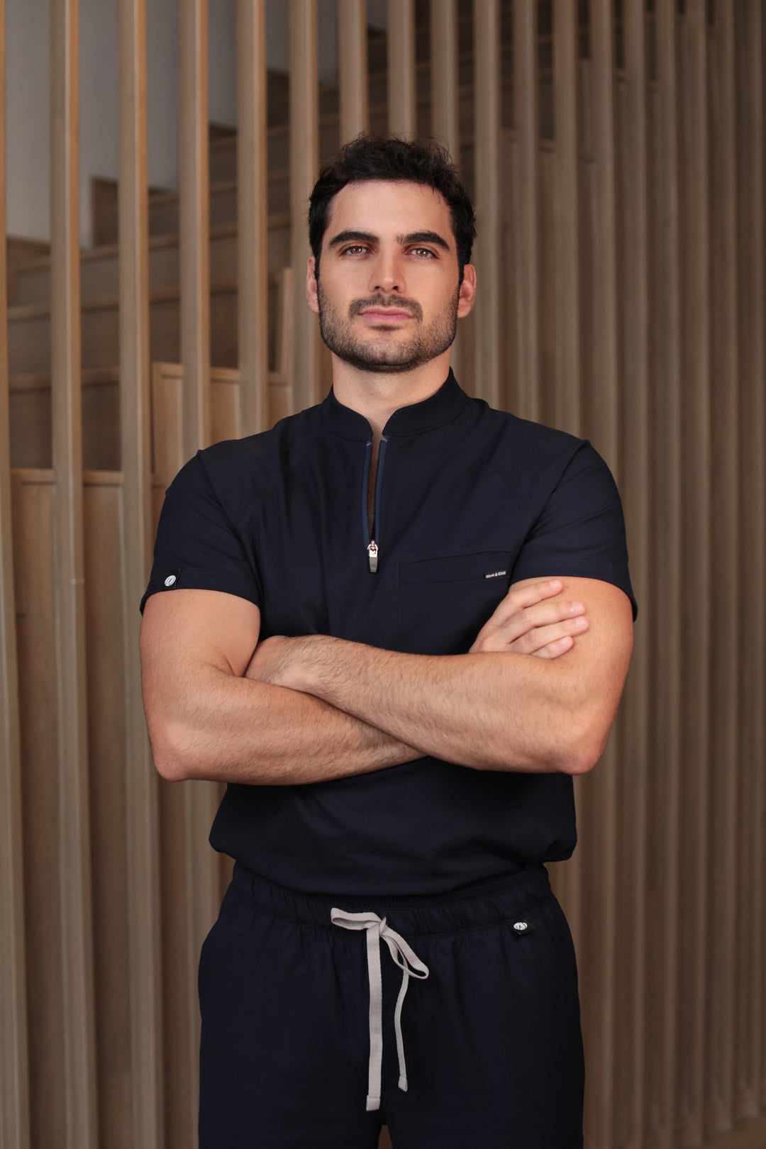 Man wearing Harry Navy Scrub Top by Work &amp; Chill