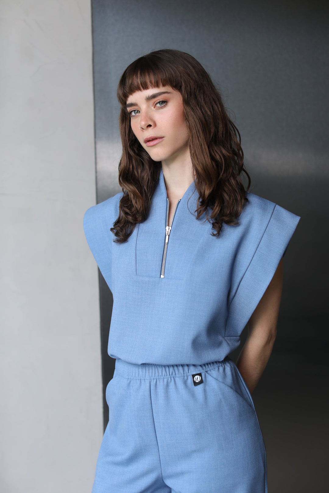 Side view of Kate Chambray Scrub Top with matching scrub pants