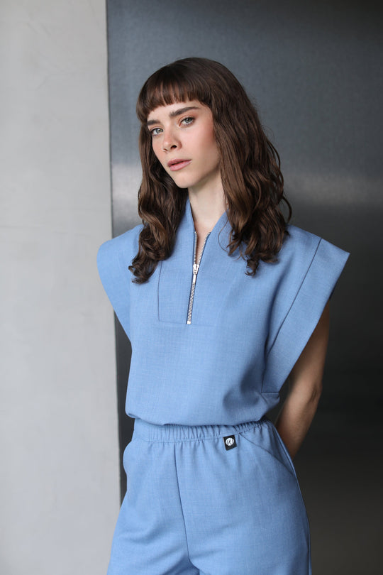 Side view of Kate Chambray Scrub Top with matching scrub pants
