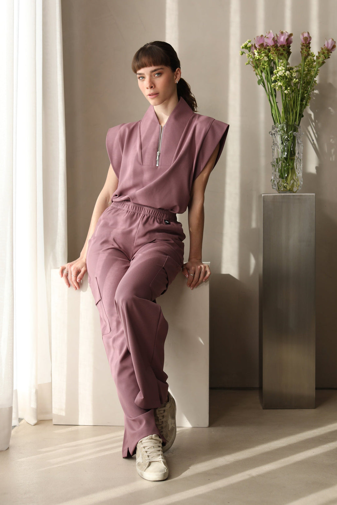 Full look of Kate Mauve Scrub Pants with matching scrub top