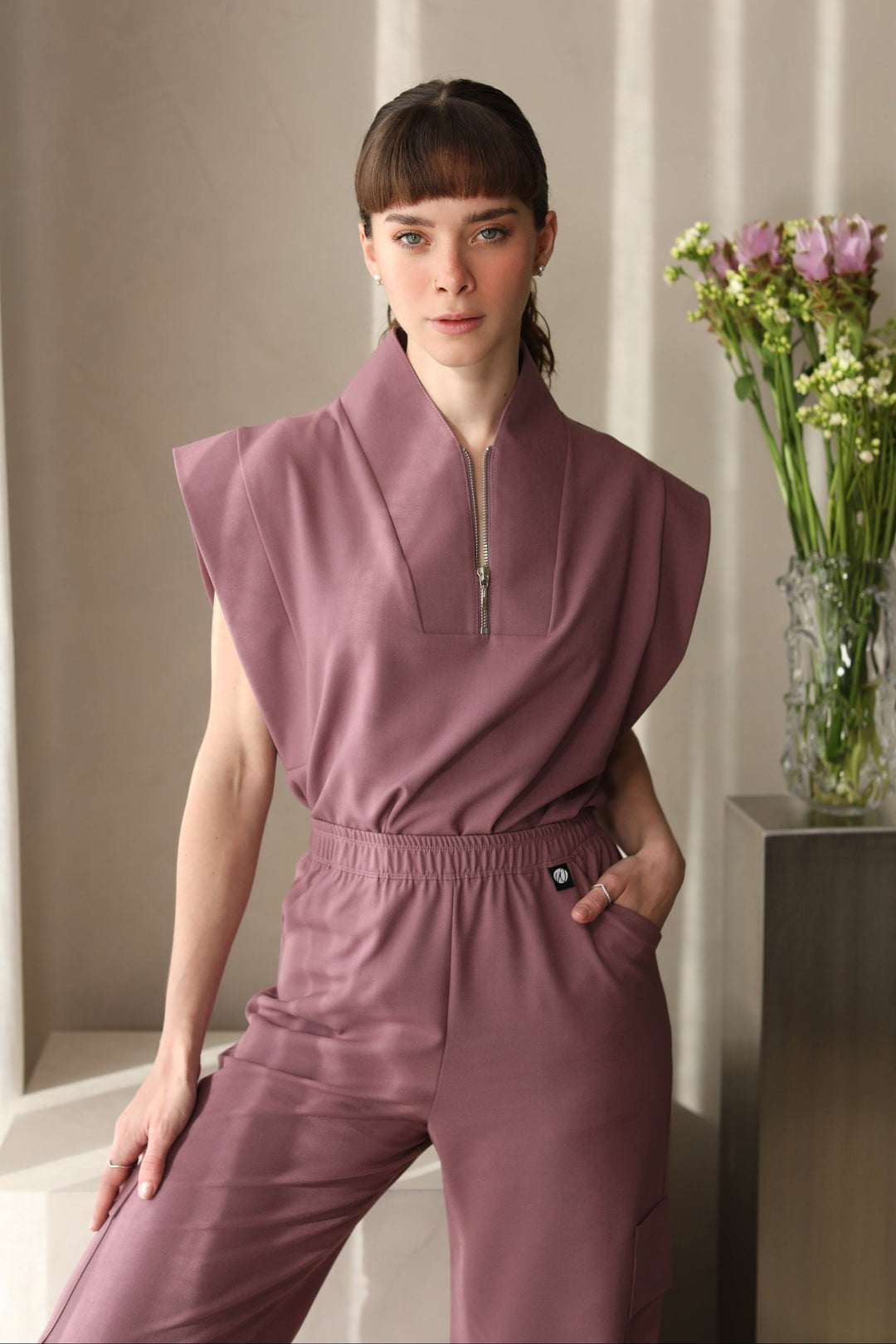 Full look of Kate Mauve Scrub Top with matching scrub pants