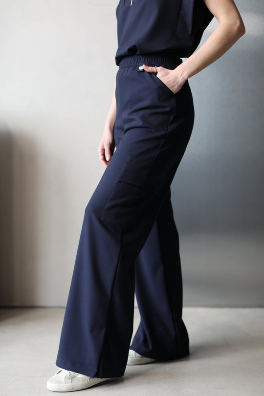 Side view of Kate Navy Scrub Pants by Work &amp; Chill