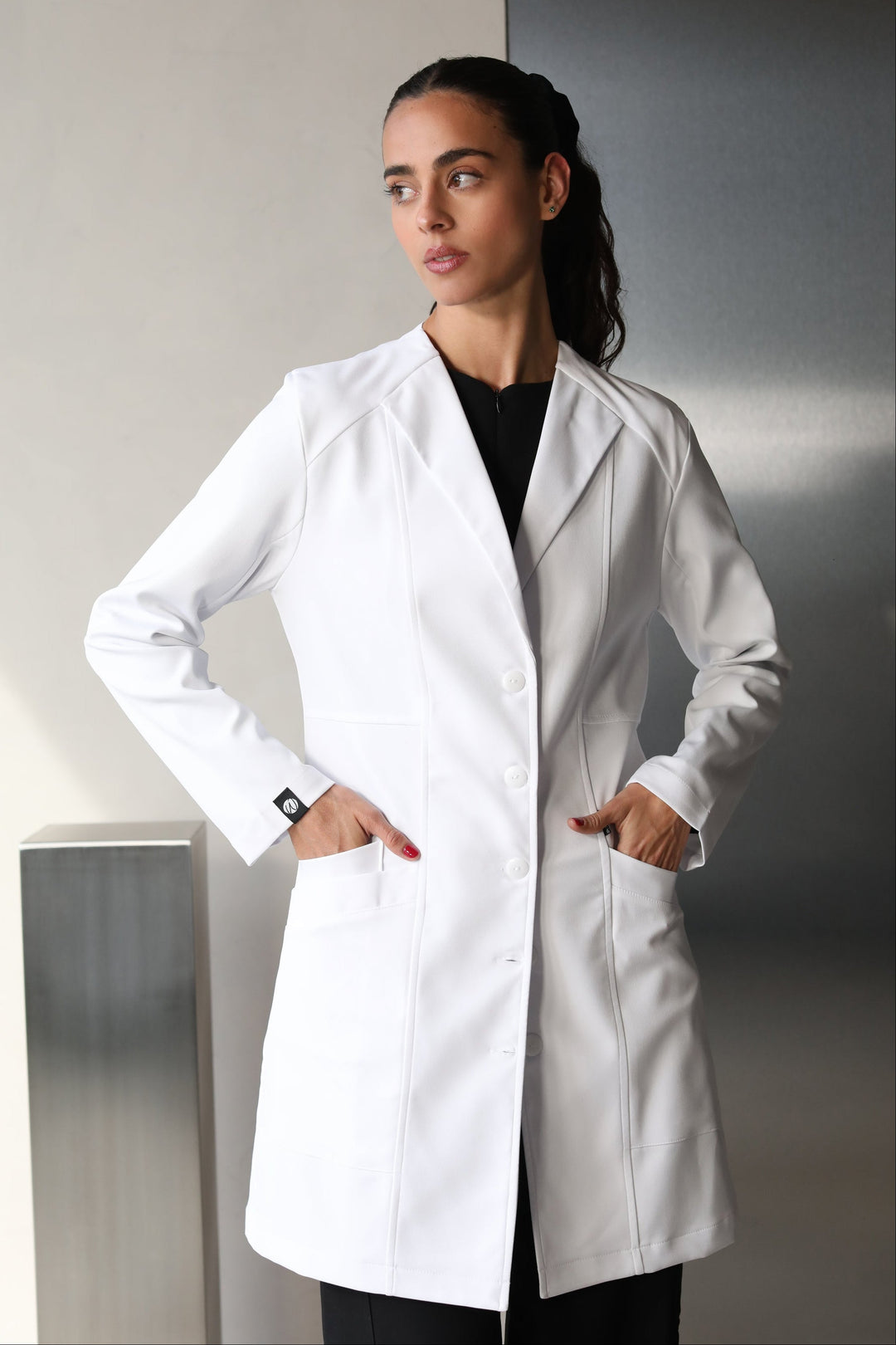 Model wearing Women’s Medic Coat in White – Work & Chill
