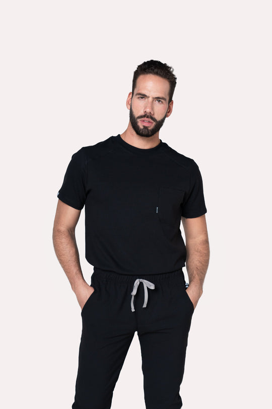 Man wearing Sport Black Scrub Top by Work &amp; Chill