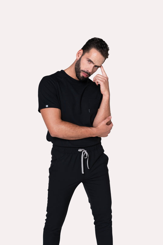 Man wearing Sport Black Scrub Top showing the relaxed athletic fit