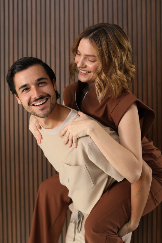 Man wearing Sport Natural Scrub Top in a relaxed lifestyle setting