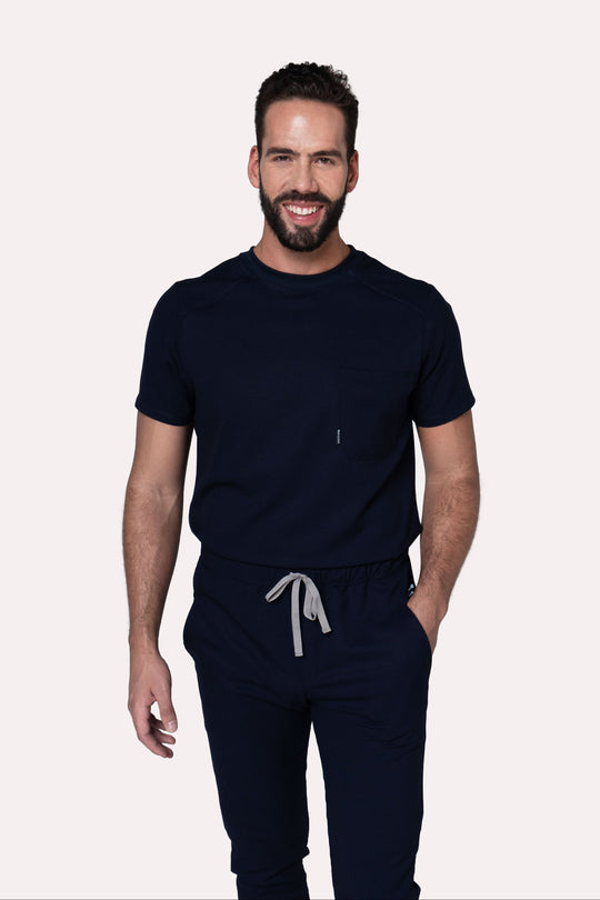 Man wearing Sport Navy Scrub Top by Work &amp; Chill