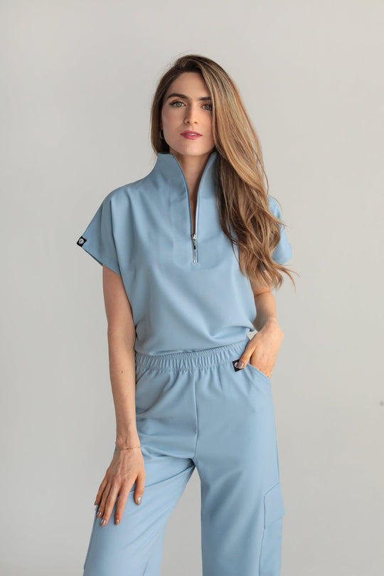 Victory Dream Blue Scrub Top styled with matching scrub pants