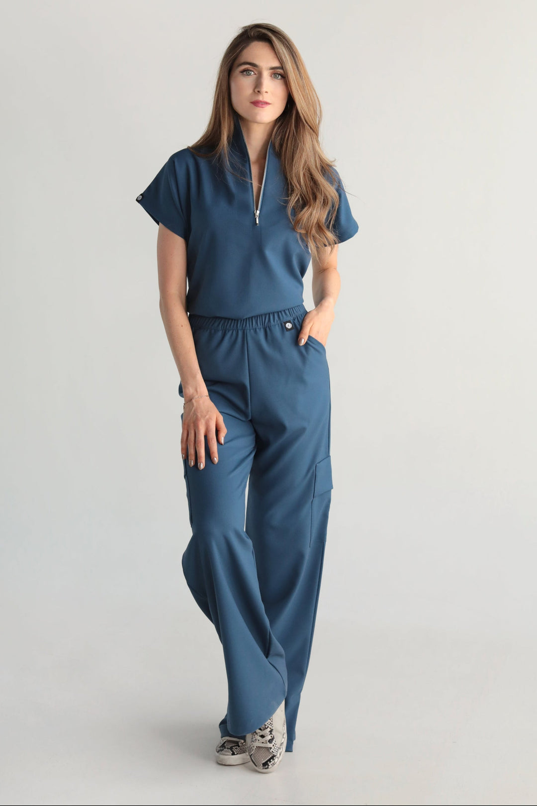 Victory Indigo Scrub Top styled with matching scrub pants